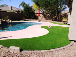 artificial grass installed by a pool side