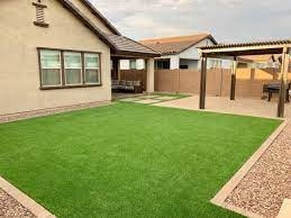 neatly installed artificial grass on a frontyard
