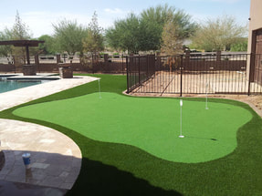 neatly installed artificial turf on a frontyard